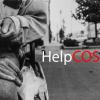 hands of a homeless person sitting on a bench. text says "help cos"